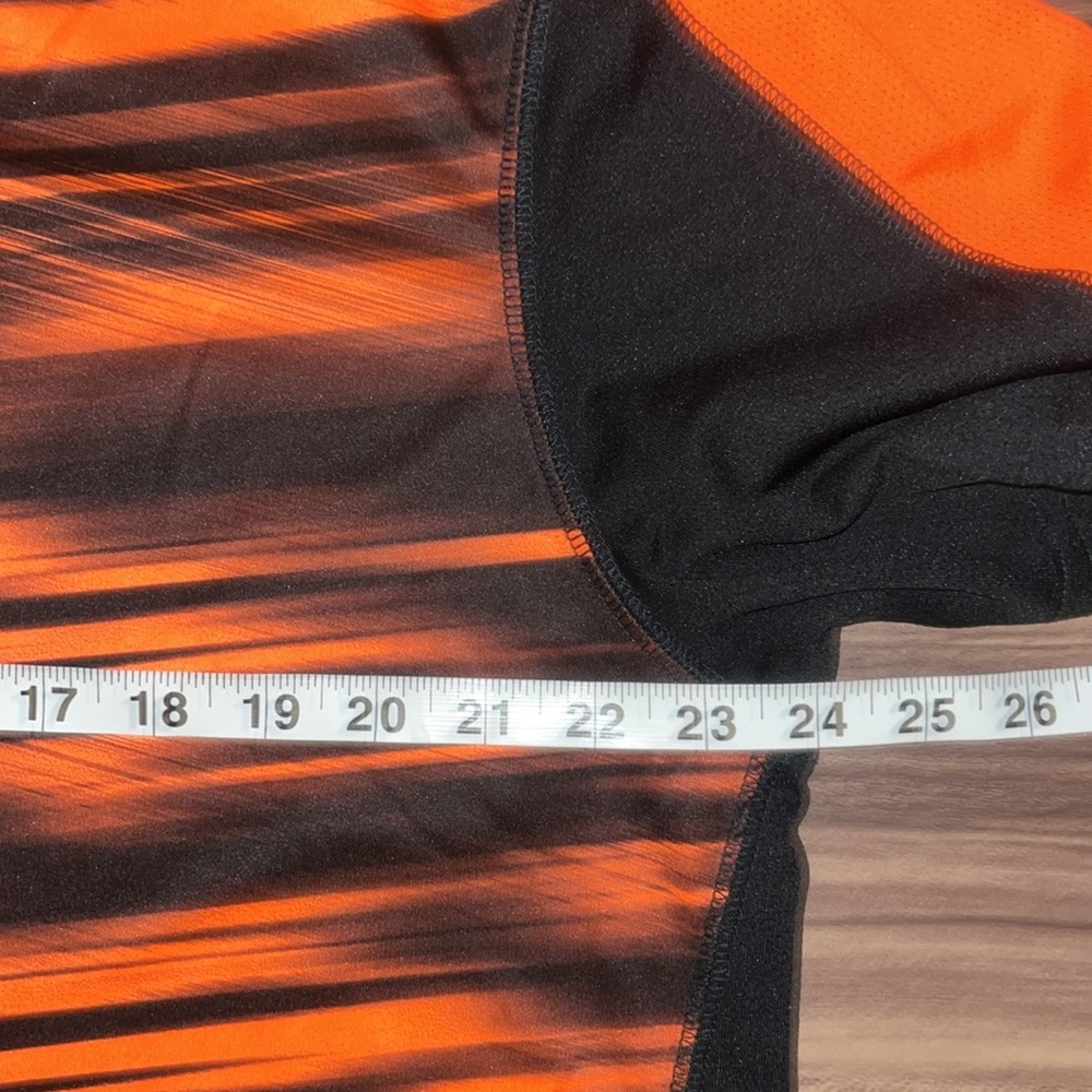 Orange and black striped short sleeve shirt. - Picture 5 of 10